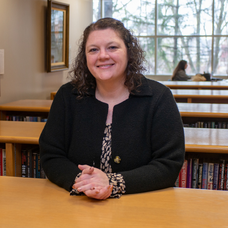 Photo of Jennifer Mart-Rice in the Law Library.