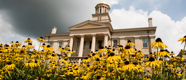 Old capitol building with flowers