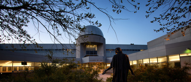 Image of the Boyd Law Building at dusk,